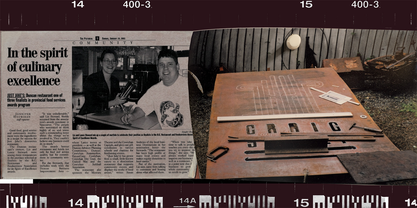 just jakes newspaper and craig street sign